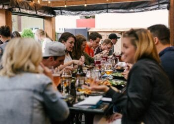 People eating a meal around a table